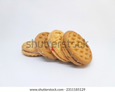 Biscuits with sweet cream isolated on white background