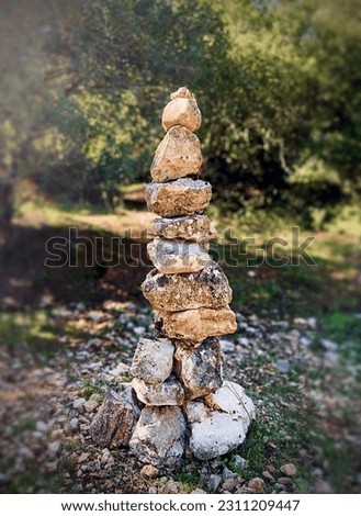 stones stacked on top of each other in a natural park