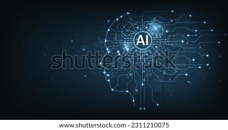 Electronic brain and Concept of artificial intelligence(AI).Graphic of a digital brain and Human head outline made from circuit board, connecting on dark blue background.  Royalty-Free Stock Photo #2311210075