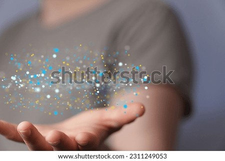 A closeup of a hand holding a 3D rendered scheme for a global networking concept