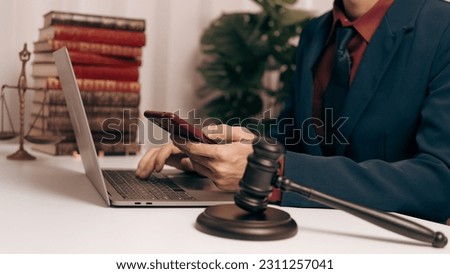 Male lawyer working with law book, A legal binding, Unilateral contract, Multilateral, Non-reciprocal contract, Default, Obligation, Power of attorney, Defense of a prescription, Court decree