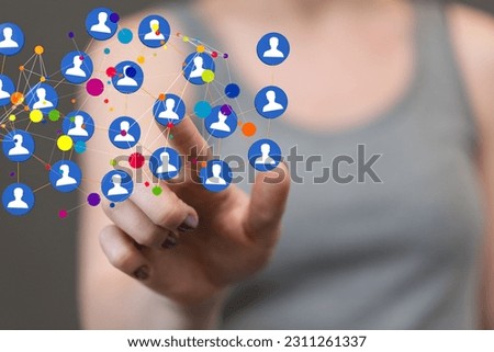 The woman's hand pointing at the hovering 3d profile icons.