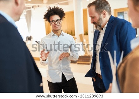 Young business man as startup founder and business partner in a discussion