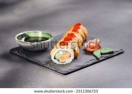 Creative pictures of sushi dishes on stone plates