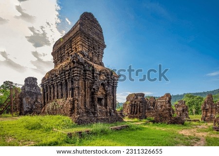 MY SON SANCTUARY IS A LARGE COMPLEX OF RELIGIOUS RELICS COMPRISES CHAM ARCHITECTURAL WORKS. A UNESCO WORLD HERITAGE SITE IN QUANG NAM, VIETNAM. LOCATED ABOUT 30 KM WEST OF HOI AN ANCIENT TOWN. Royalty-Free Stock Photo #2311326655