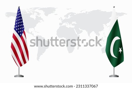 United States and Pakistan flags for official meeting against background of world map.