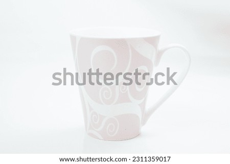 Porcelain mug  isolated on white background with shadow  photographed in studio