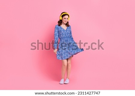 Full length photo of gorgeous cheerful pretty lady wear blue stylish clothes have fun listening music isolated on pink color background