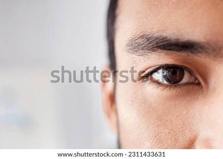 Vision, eye and portrait of man, thinking and ideas for startup business with focus and commitment. Motivation, face closeup and eyes of young businessman with calm mindset and person with an idea Royalty-Free Stock Photo #2311433631