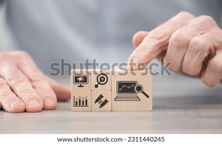 Wooden blocks with symbol of market analysis concept