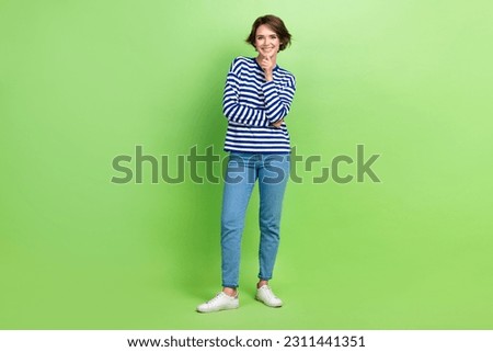 Full body photo of young attractive woman bob brown hair touch chin thoughtful posing wear new clothes isolated on green color background