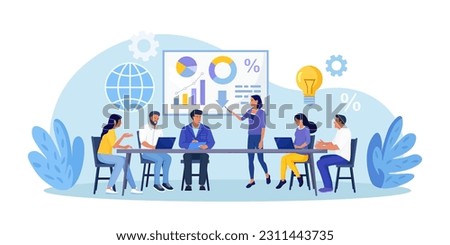 Business Training, Coaching and Education. Mentor Presenting Charts, Diagrams and Reports before Audience. Coach Speaking before Business People at Conference, Lecture. Employees Meeting at Seminar Royalty-Free Stock Photo #2311443735