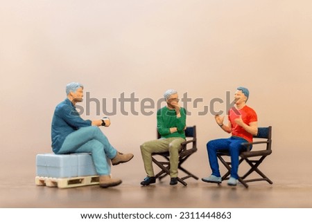 Miniature people ,People showed up to socialize and have fun, Friendship day concept Royalty-Free Stock Photo #2311444863