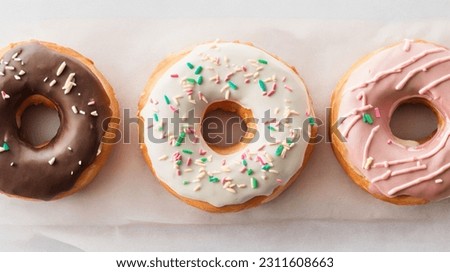A picture of three delicious donuts