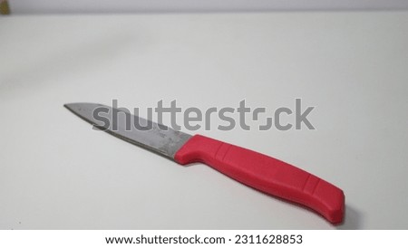 Knife on a white background - Utility Knife Pictures, Images and Stock Photos