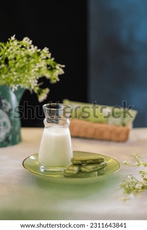 Cookies and milk on the table