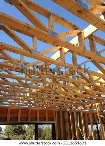 Floor Joists Installed at Residential Construction Site Royalty-Free Stock Photo #2311651691