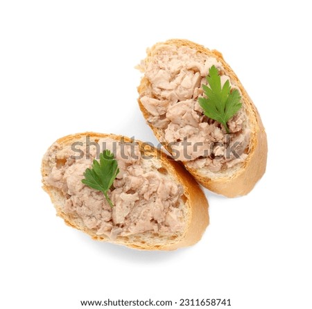 Tasty sandwiches with cod liver and fresh parsley isolated on white, top view