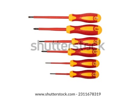 Set of red-yellow screwdrivers isolated on white background. Builder's and electrician's tool. Tools. Construction concept. Royalty-Free Stock Photo #2311678319