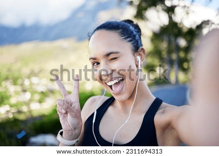 Happy woman, fitness and selfie with peace sign for profile picture in social media or online post in nature. Portrait of funny female person or runner with fun expression for photo or vlog outdoors