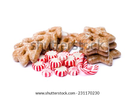 Christmas cookies and candy on white background