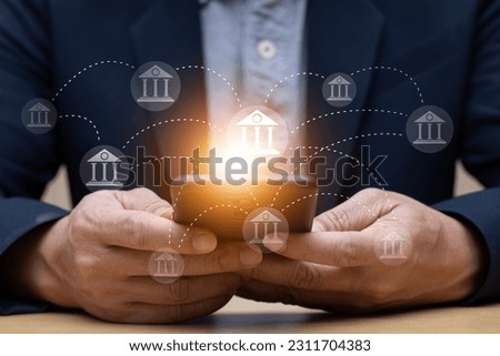 online banking concept Links between financial institutions Financial network with people using smartphones Royalty-Free Stock Photo #2311704383