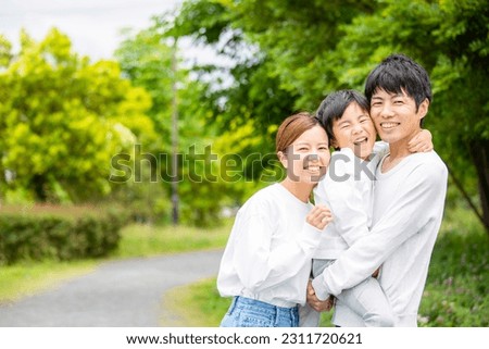 Japanese, family, fresh green season, portrait of a young family in the park