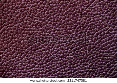 Texture of genuine leather, granate color, background, surface. For your backdrop,  copy space