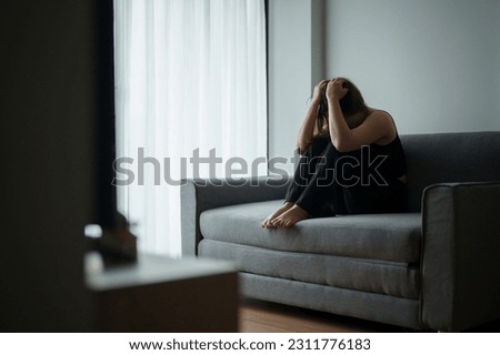 Mental health problem, Sad asian female anxiety depressed lonely in his home.
 Royalty-Free Stock Photo #2311776183