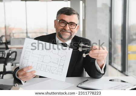 Real estate agent explaining contract.