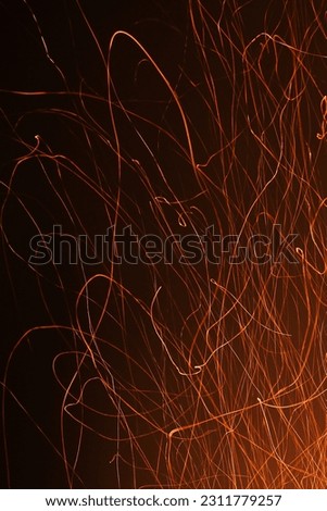 Sparks on a black background. Sparks of fire