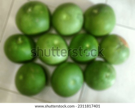 defocused abstract picture of pomelo fruit (citrus maxima)