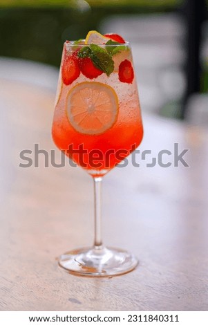 Red Strawberry Cocktail with Lemon and Mint