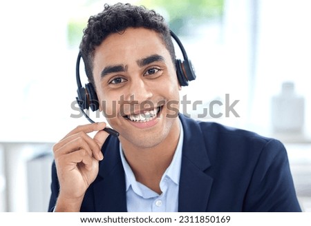 Portrait, call center and business man smile in office for support, customer service or telemarketing. Face, contact us and sales agent, crm consultant and person from Brazil consulting at help desk. Royalty-Free Stock Photo #2311850169