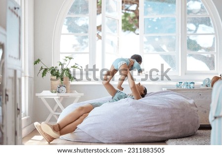 Happy mother, play and holding baby in air at home for love, care and quality time together for childhood development. Mom, infant and carrying newborn kid on bean bag, nursery room and relax for fun Royalty-Free Stock Photo #2311883505