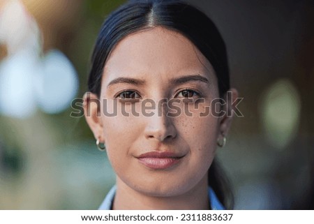 Woman, serious and portrait in a closeup with thinking in the outdoor with an idea in mexico. Face, female person and beauty with focus and calm with vision, eye and skin with concentration for goal. Royalty-Free Stock Photo #2311883637