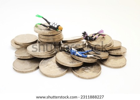 diver finding treasure chest filled with coins
