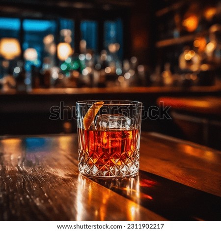Old fashioned cocktail in a dimly lit late night bar. Moody atmosphere, cosy and warm. Late night cocktail bar, restaurant. Royalty-Free Stock Photo #2311902217