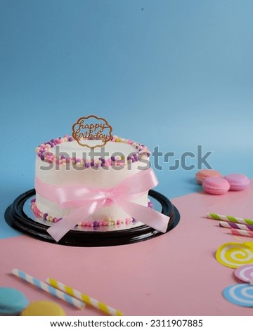 Birthday cake  on colorful background  