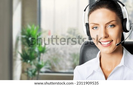 Representative call center. Businesswoman, support phone operator in headset, sitting against office window background. Customer service help consulting concept photo. Sale agent.