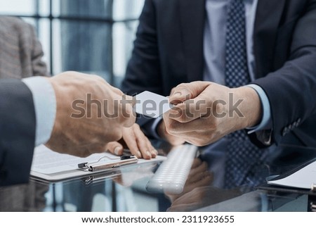 businessman offer personal contact information to customer, acquaintance concept Royalty-Free Stock Photo #2311923655