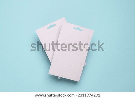 White empty id card on blue background