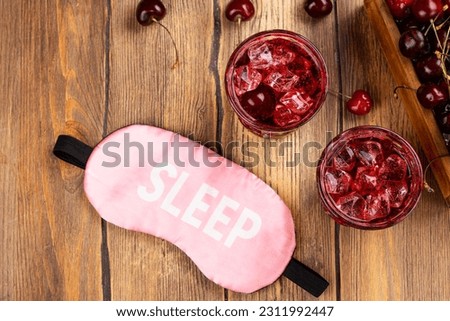 Trendy sleepy girl mocktail. Popular cherry drink for deep sleeping Royalty-Free Stock Photo #2311992447