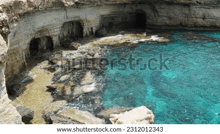 Sea caves cape greco Cyprus blue lagune water sea travel views cliff