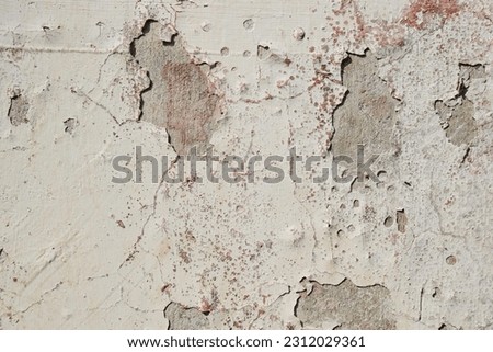 Weathered wall pattern, damaged floor close-up, architectural background, no people.