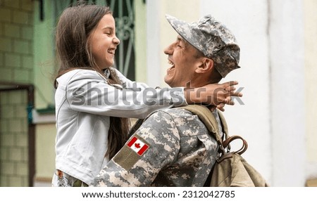 Flag of Canada on military uniform. Canadian soldiers. Army of Canada. Remembrance Day. Canada Day Royalty-Free Stock Photo #2312042785