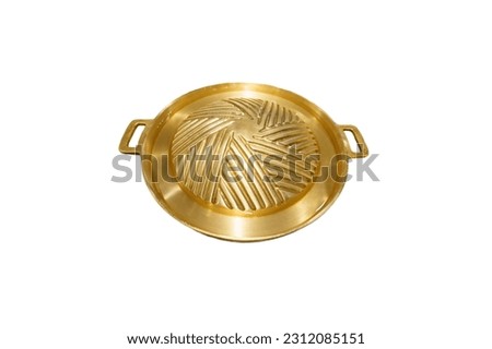 Brass pan for grilling on white background.barbecue pan.Isolate Royalty-Free Stock Photo #2312085151