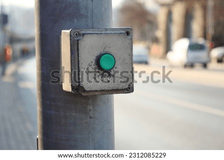 close up of crossing signal button in singapore  Royalty-Free Stock Photo #2312085229