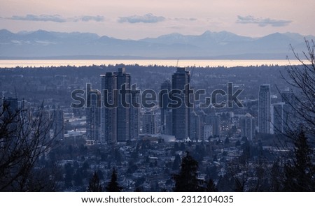 Apartment Buildings in Metro Vancouver Area. Twilight Sunset. Burnaby Mountain, BC, Canada.