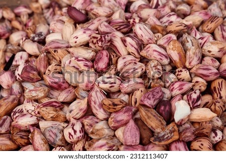 Close up of reddish peanut seeds